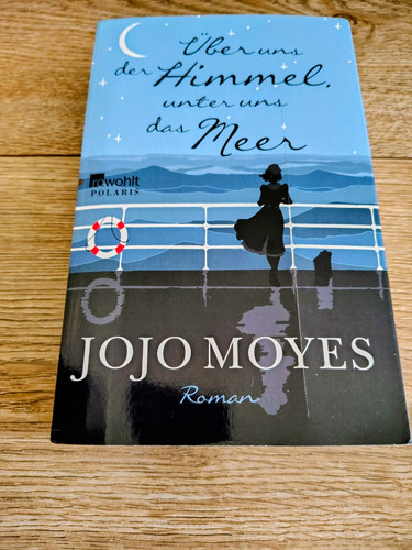 Jojo moyes über uns der - moyes:,